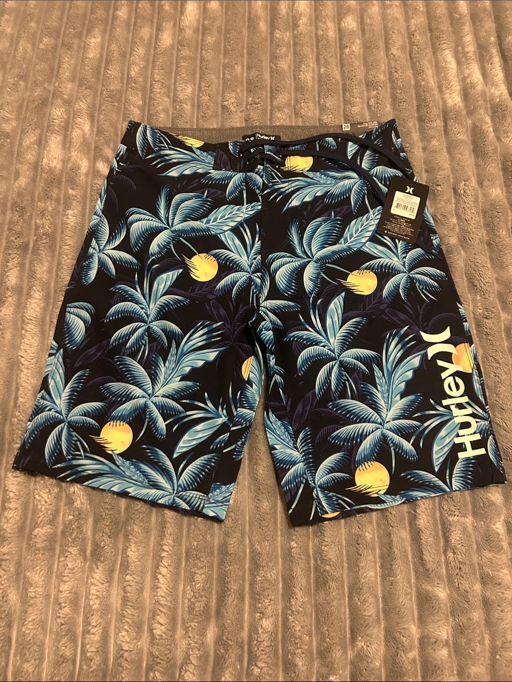Hurley Boy's Black Swim Board Shorts with Blue Palm Print and Yellow Accents